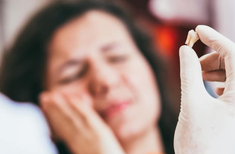 Patient with tooth pain after extraction at Daylight Dental in Austin TX