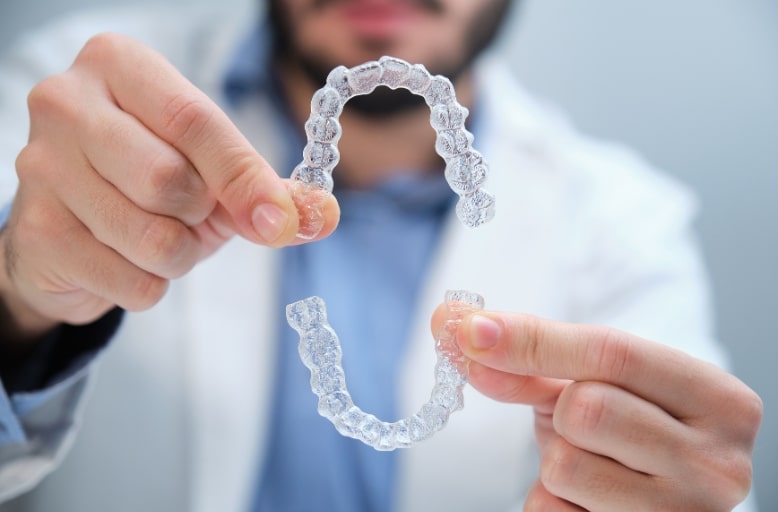 Invisalign maintenance and aftercare tips in South Austin TX for keeping clear aligners clean, comfortable, and effective for long-term results