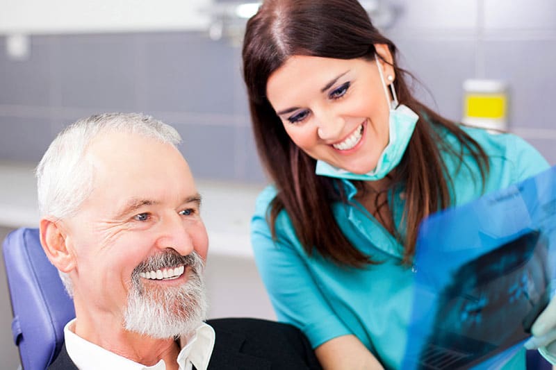 Dental implants as a fixed alternative to removable dentures