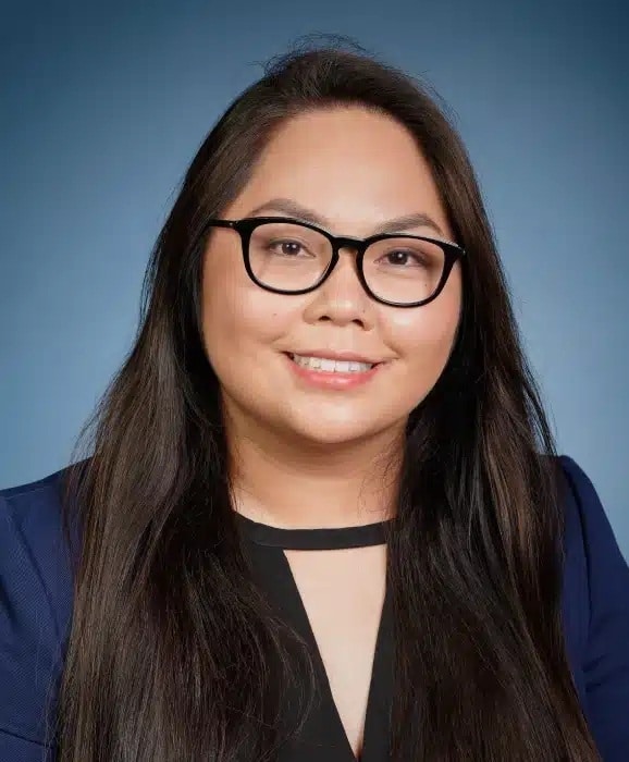 Professional portrait of Dr. Yvonne Tran at Daylight Dental providing modern family dental care.