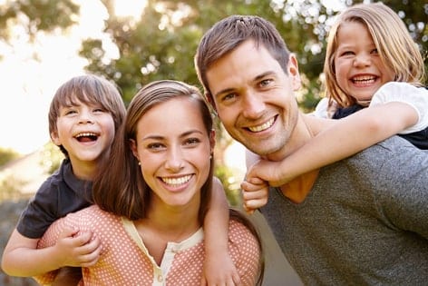 Family visiting a family dental care in South Austin, TX for preventive and routine dental care