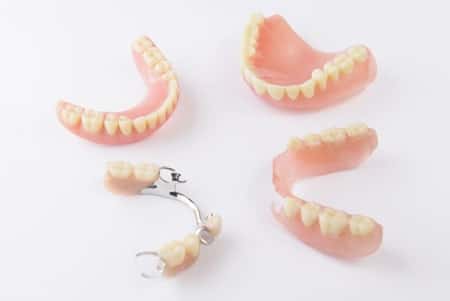 Full and partial dentures in South Austin displayed on a clean white background at Daylight Dental